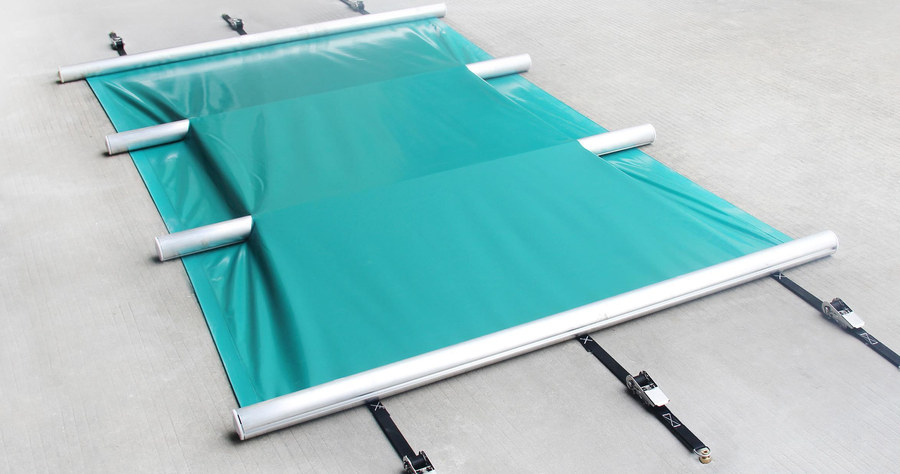 Turquoise protective pool cover with aluminium support bars